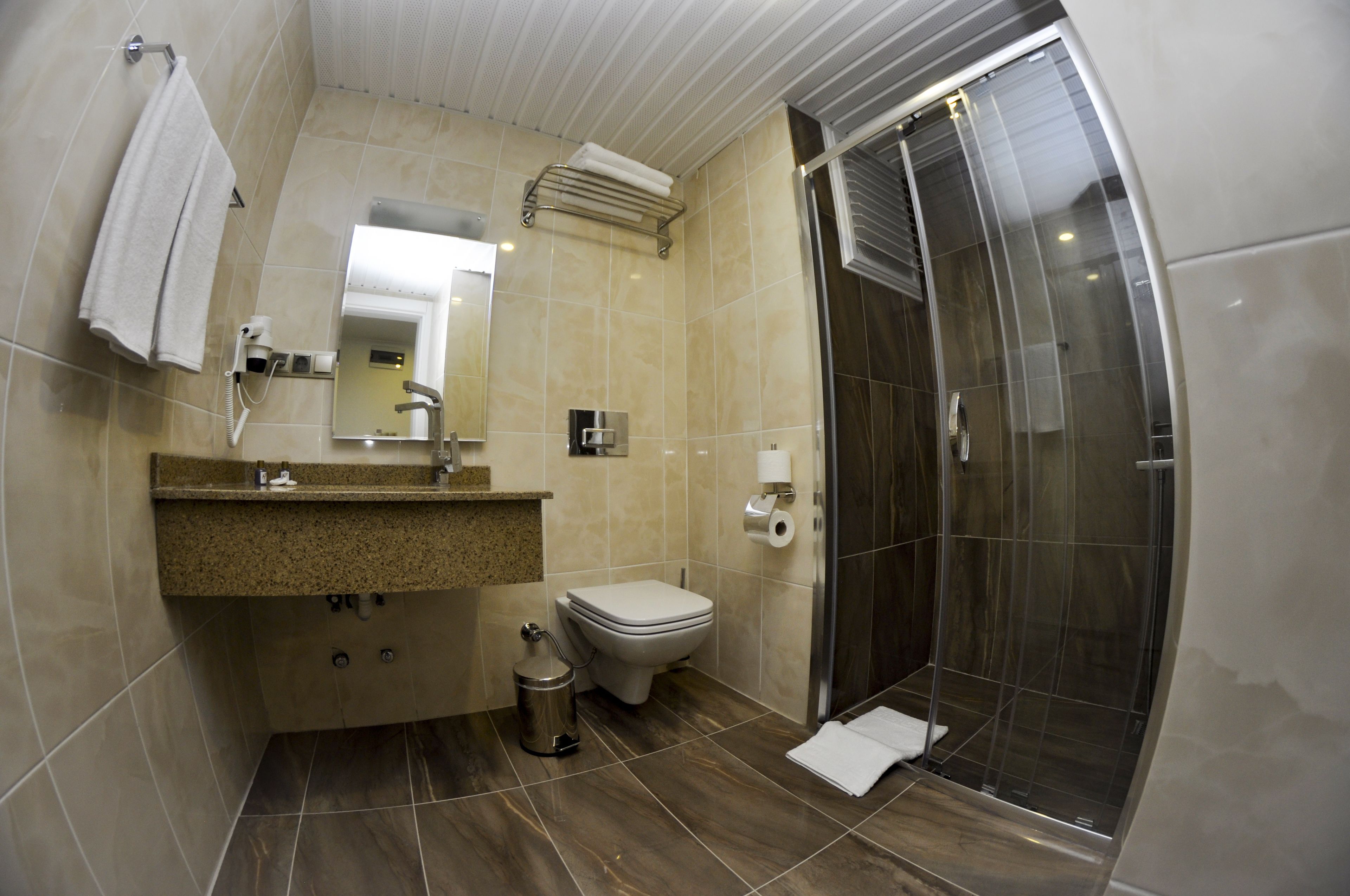 shower, free toiletries, hair dryer, slippers