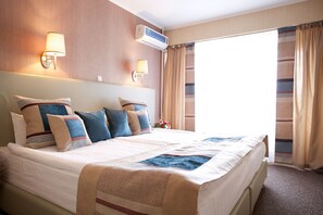 Suite, 1 Double or 2 Single Beds | 1 bedroom, premium bedding, minibar, in-room safe - Club Hotel Dostuk (Bishkek)