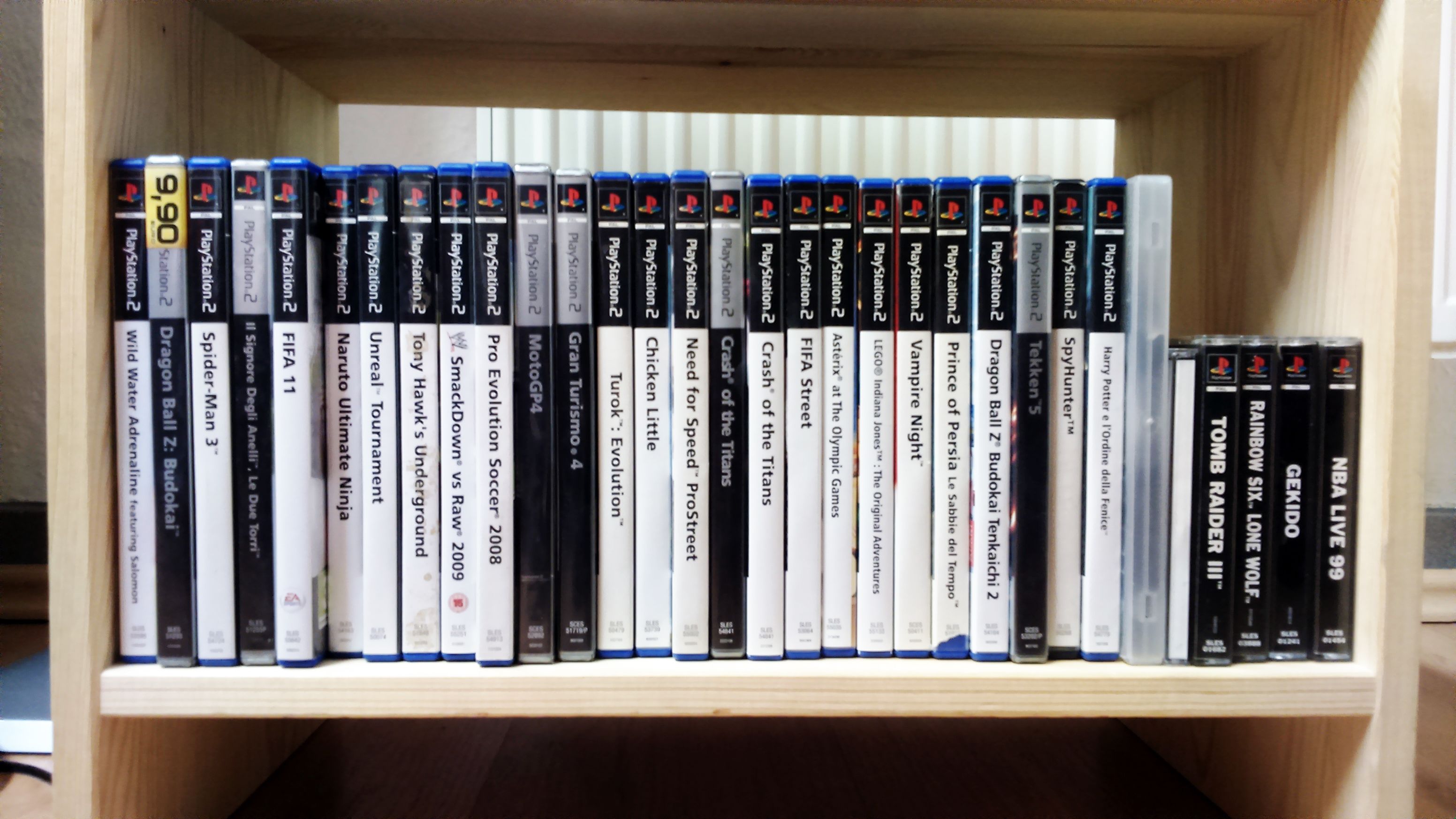 A bookshelf filled with video game cases.