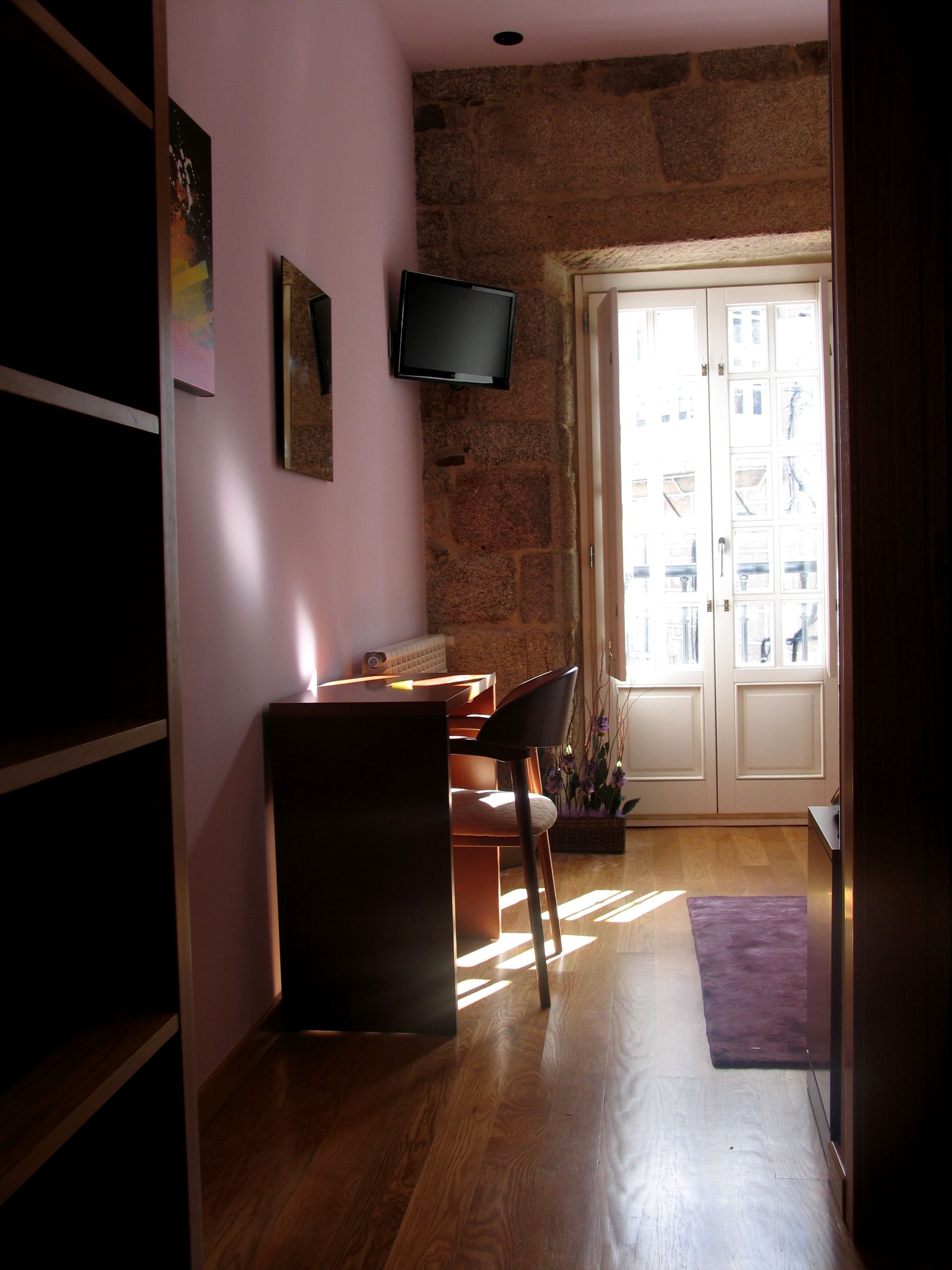 standard double room, city view | premium bedding, minibar, individually decorated, individually furnished