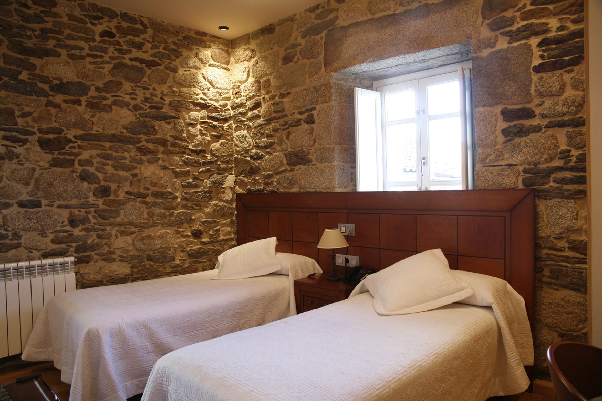 standard twin room, city view | premium bedding, minibar, individually decorated, individually furnished