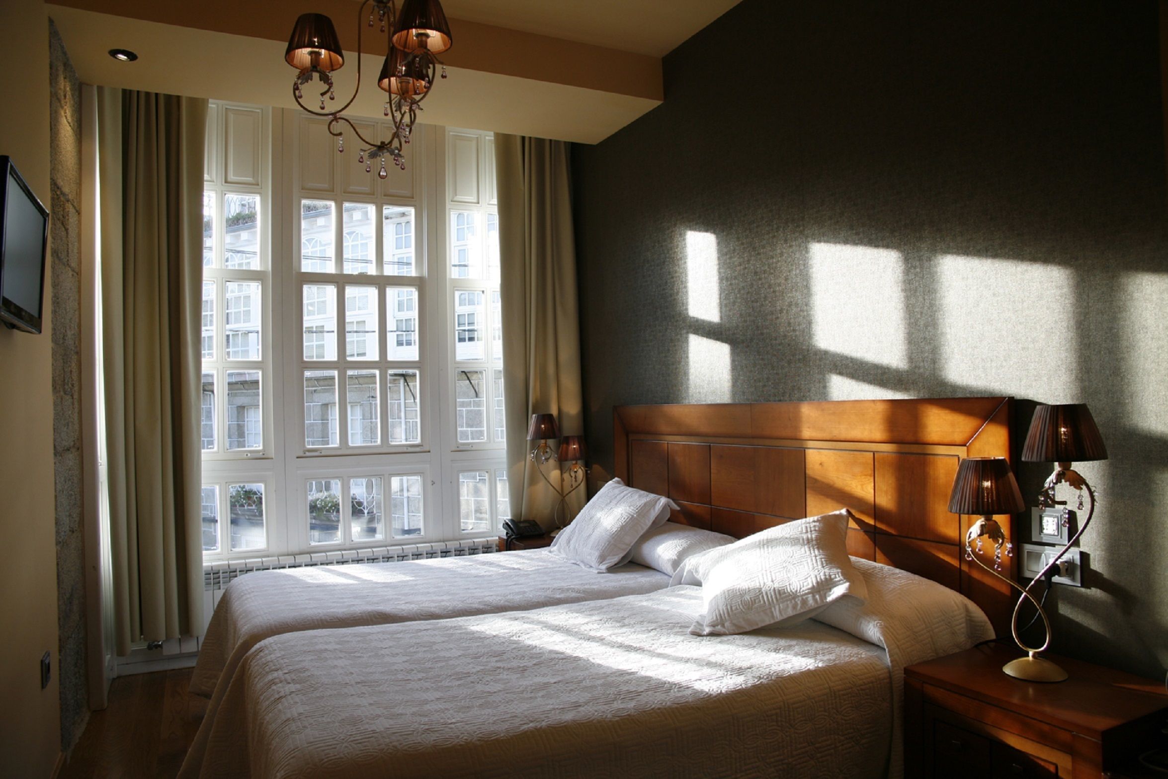 standard twin room, city view | premium bedding, minibar, individually decorated, individually furnished