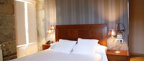 Dobbeltrom – standard, byutsikt | Sengetøy av topp kvalitet, minibar og individuelt dekorert