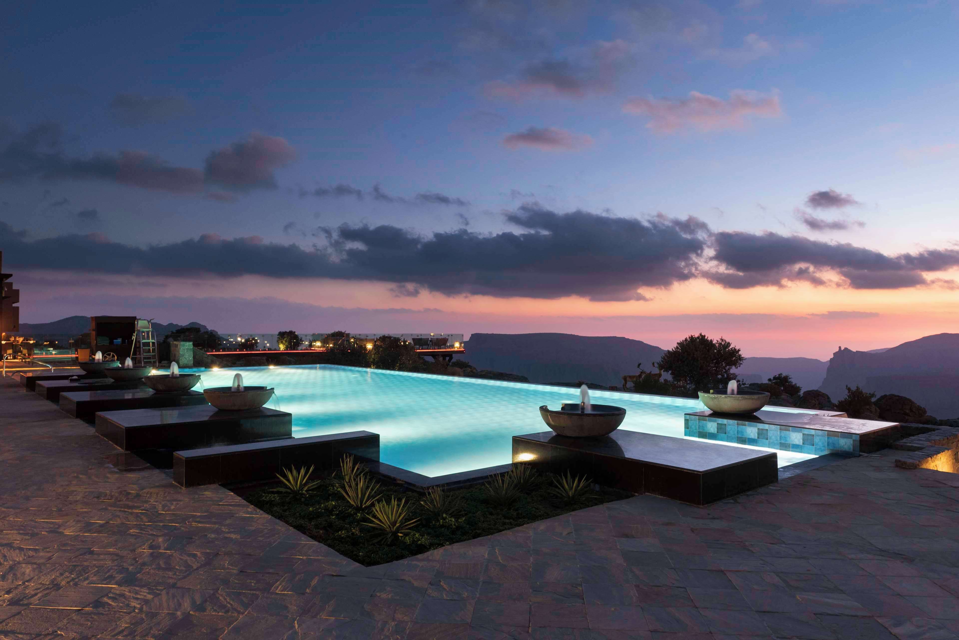 outdoor pool, pool umbrellas, pool loungers