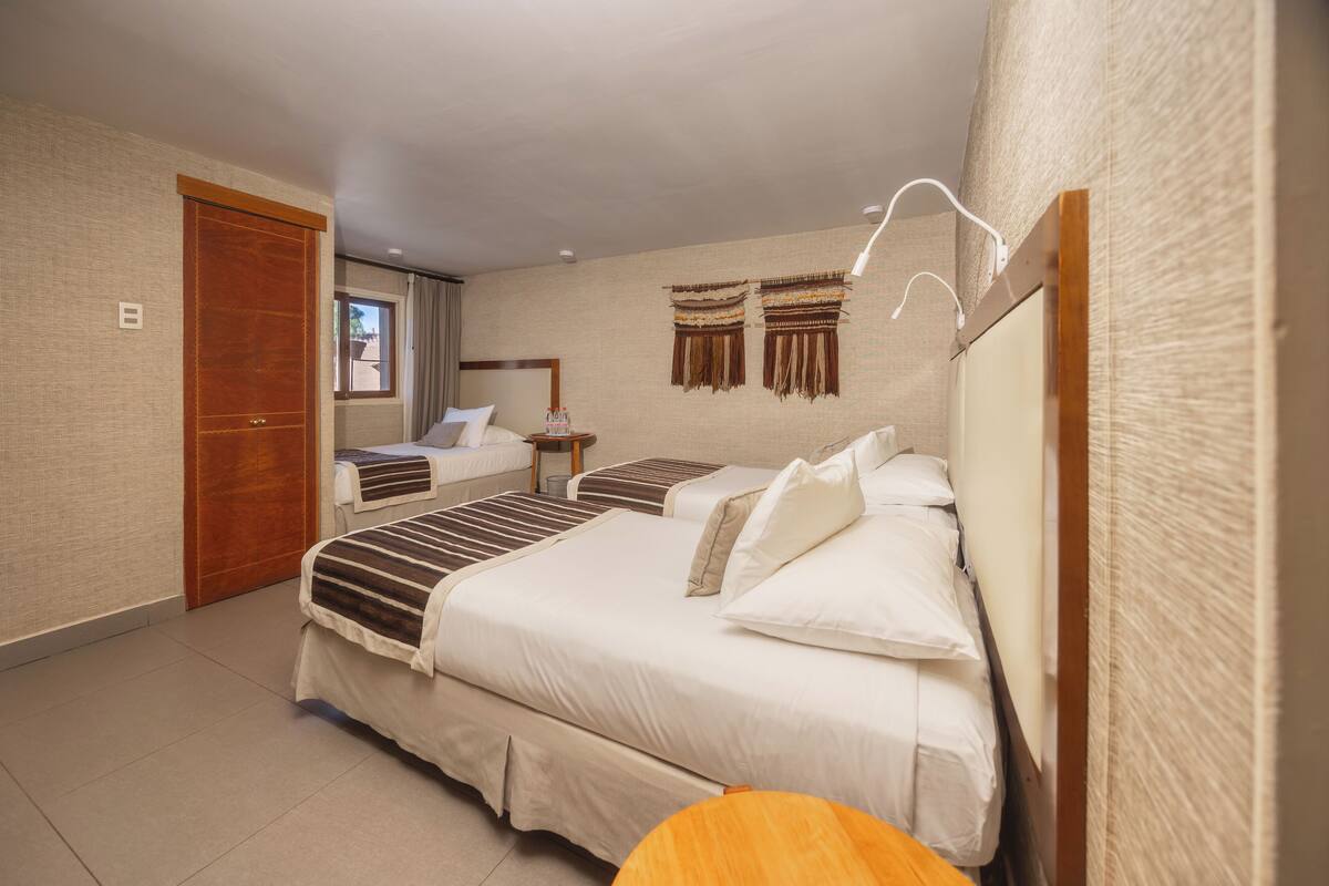 triple room | premium bedding, pillow-top beds, in-room safe, blackout curtains