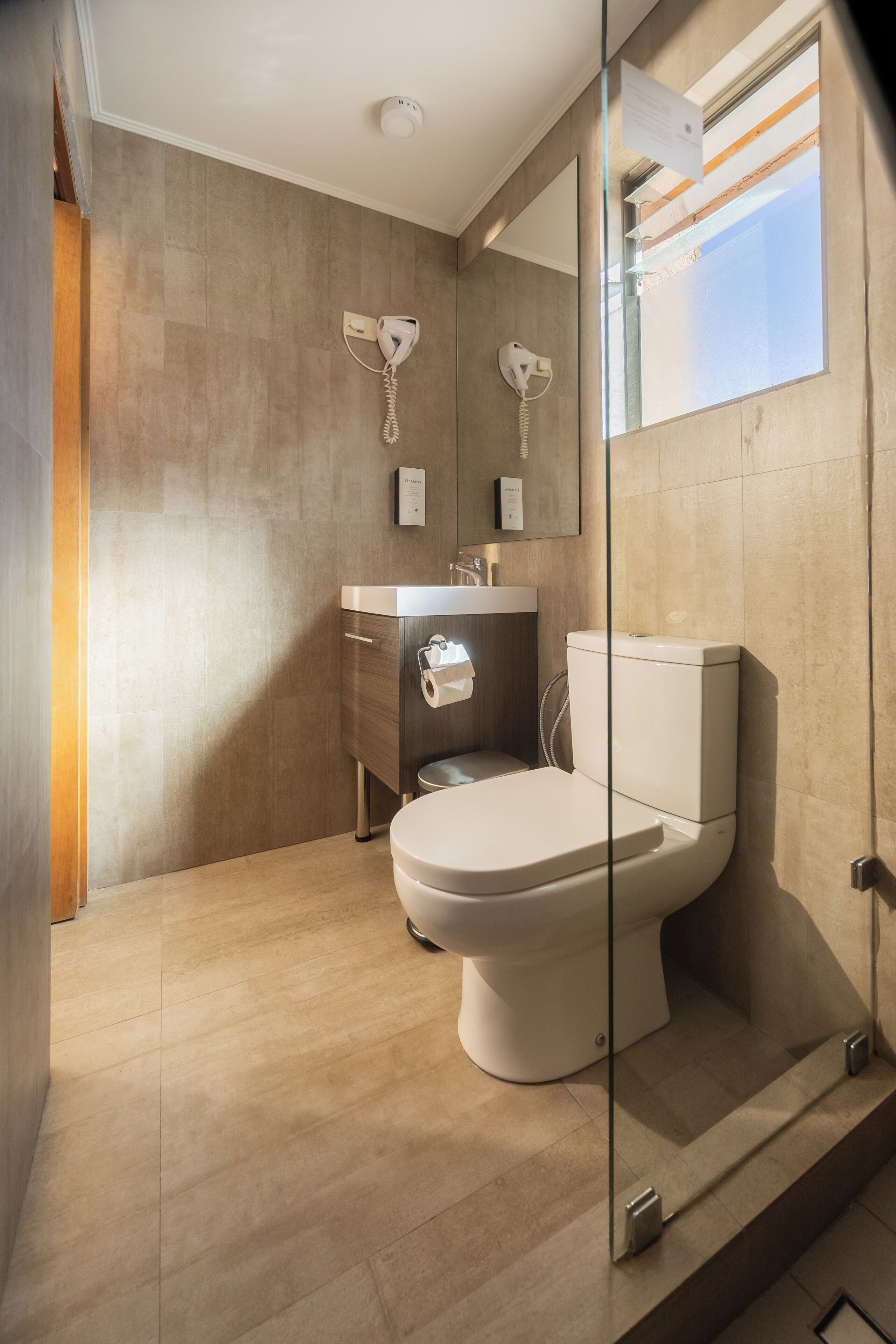 standard double room, 1 king bed | bathroom | shower, eco-friendly toiletries, towels