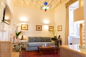 Appartement Deluxe, 1 chambre, vue ville | Coin séjour