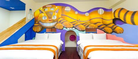 A hotel room with two beds, a large mural of a tiger, and a slide.