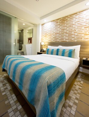 Habitación doble superior (Plus) | 1 dormitorio y ropa de cama