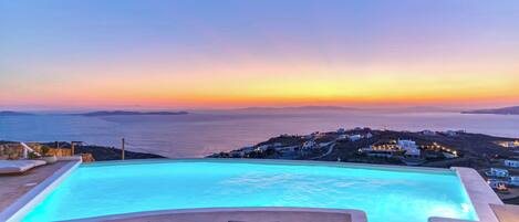 2 outdoor pools, an infinity pool, sun loungers