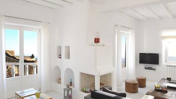 Luxury Villa, 3 Bedrooms, Pool Access, Sea Facing | Living area | TV, fireplace, DVD player
