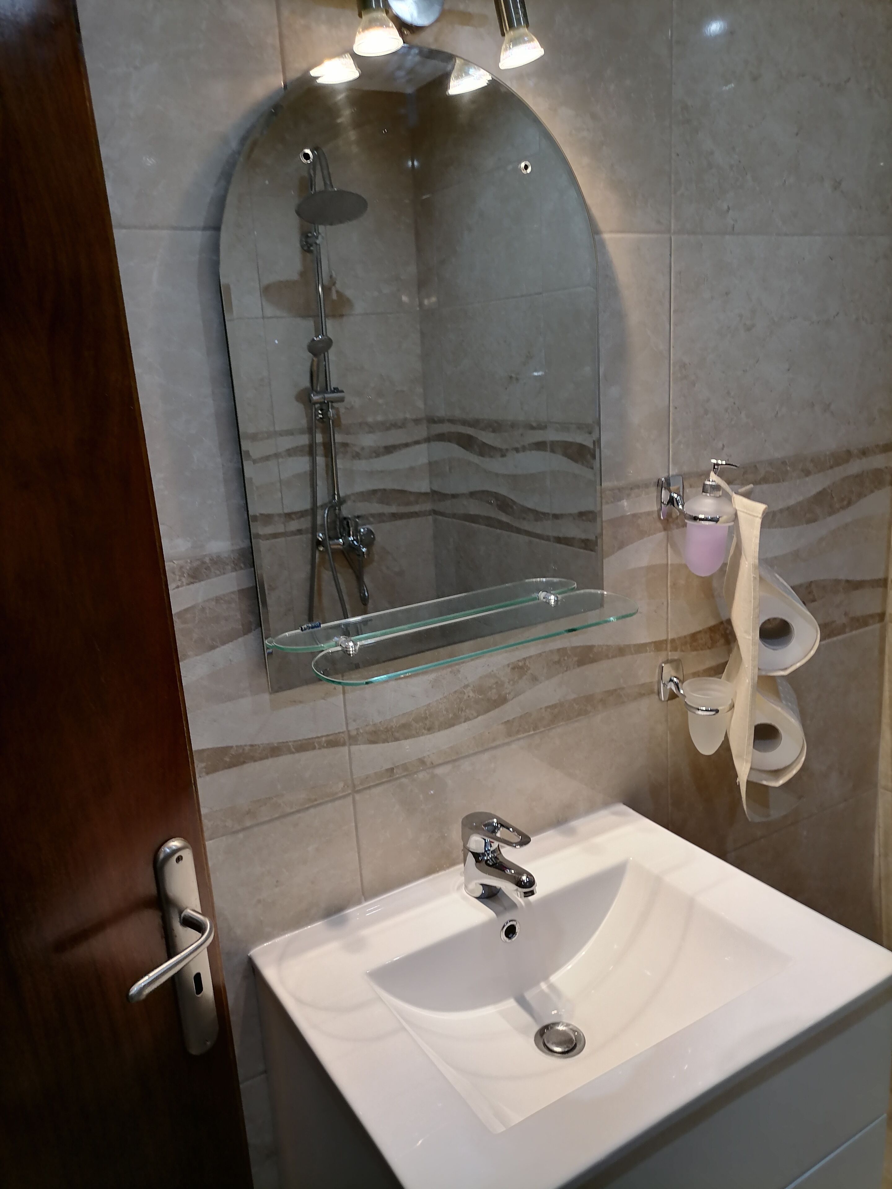 mini suite pool view | bathroom | rainfall showerhead, hair dryer, towels, soap