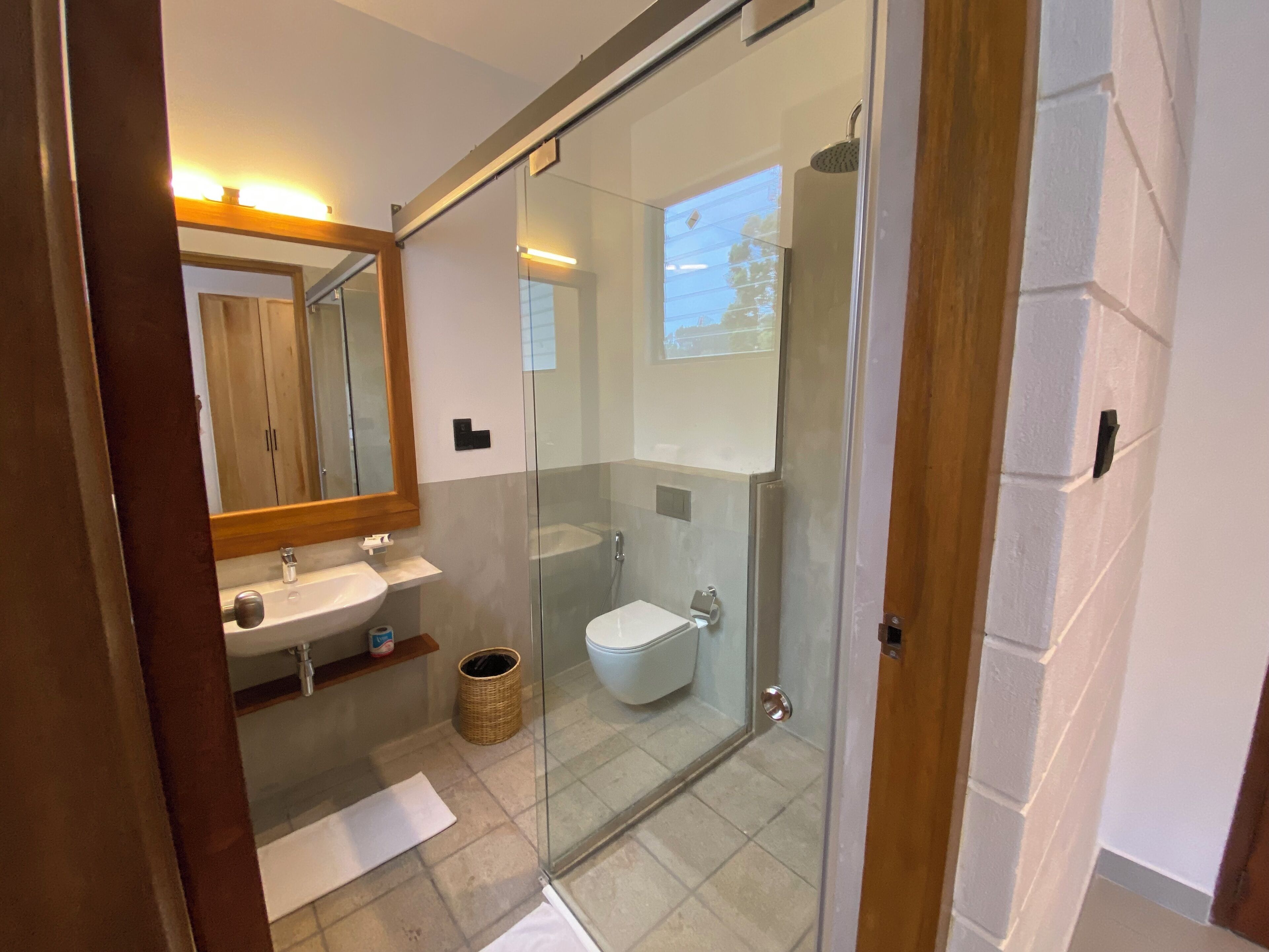 deluxe double room, 1 king bed | bathroom | shower, rainfall showerhead, designer toiletries, hair dryer