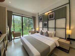 Deluxe-Doppel- oder -Zweibettzimmer, Gartenblick | Hochwertige Bettwaren, Minibar, Zimmersafe, individuell dekoriert