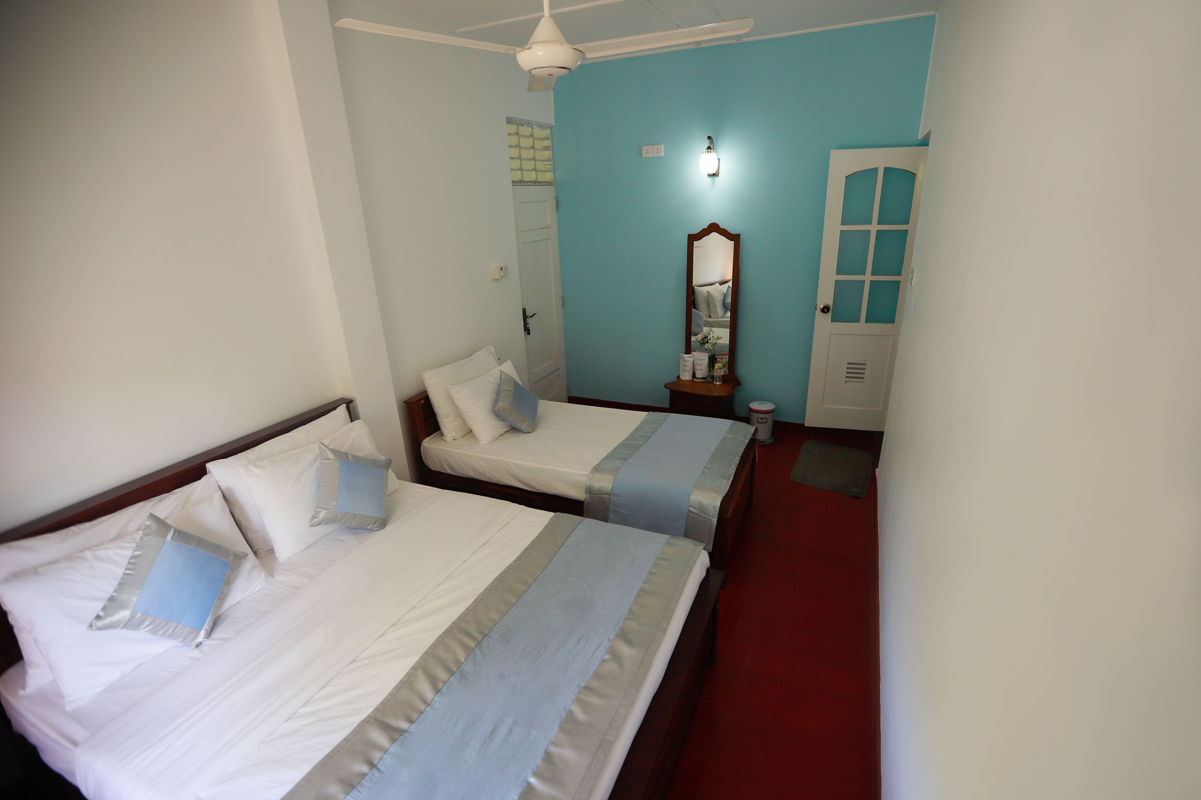 deluxe triple room  | premium bedding, desk, iron/ironing board, free wifi