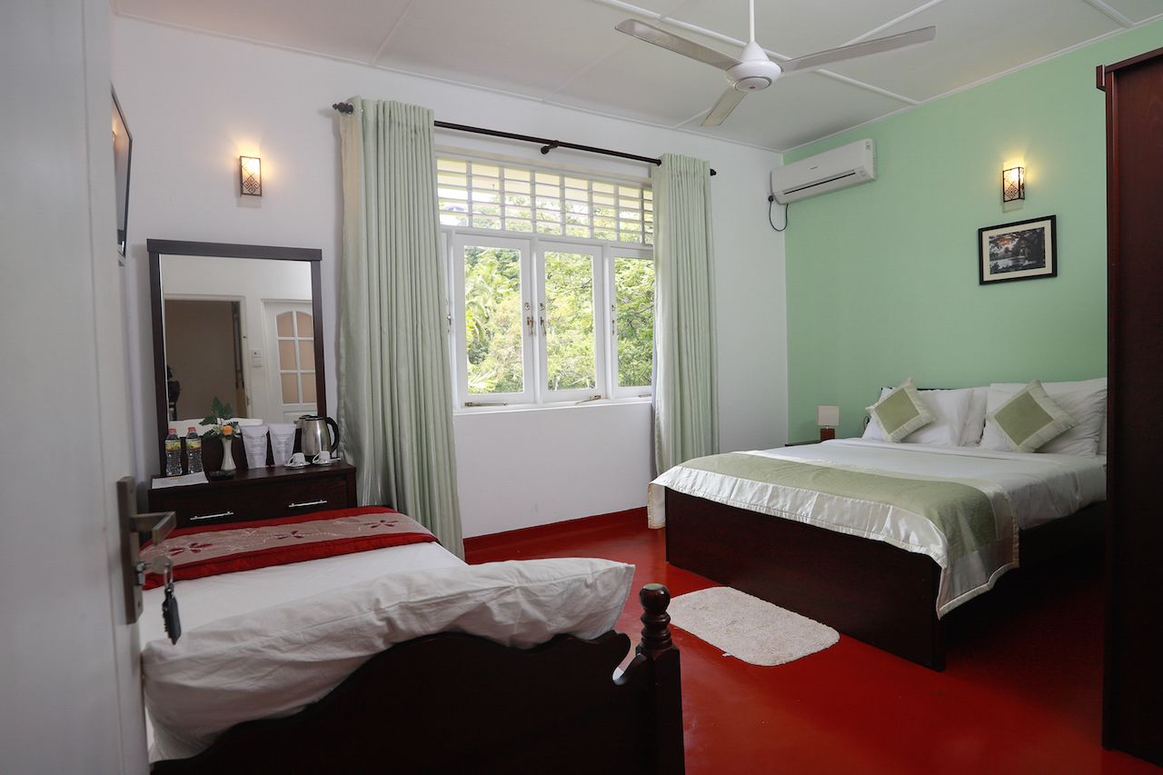 deluxe triple room  | premium bedding, desk, iron/ironing board, free wifi