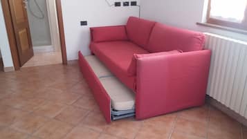 Studio, 1 Tempat Tidur Queen dengan tempat tidur Sofa | Area keluarga | TV layar datar