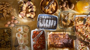 A variety of food items including eggs, bread, and a casserole dish. - Hotel Xifoupolis (Monemvasia)