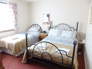 Family Room | Premium bedding, soundproofing, iron/ironing board, free WiFi