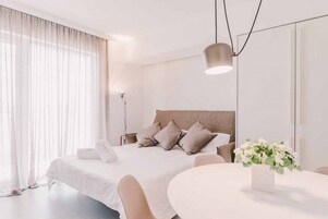 Suite, 1 Bedroom, Balcony | 1 bedroom, Frette Italian sheets, premium bedding, down comforters