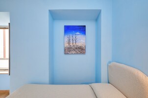 Habitación cuádruple familiar | Colchones con acolchado adicional, escritorio, cortinas opacas