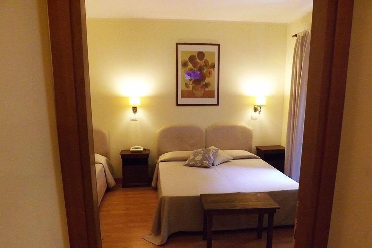 Pillow-top beds, desk, blackout curtains