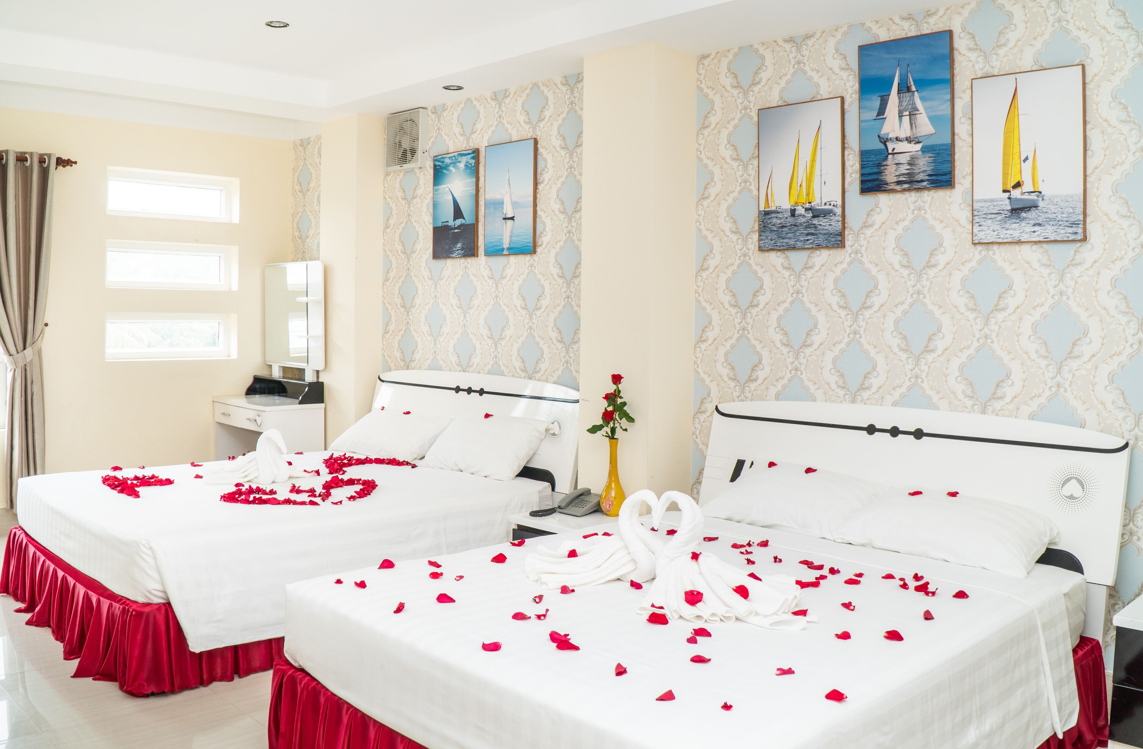 Family Quadruple Room | Minibar, individually furnished, desk, blackout curtains