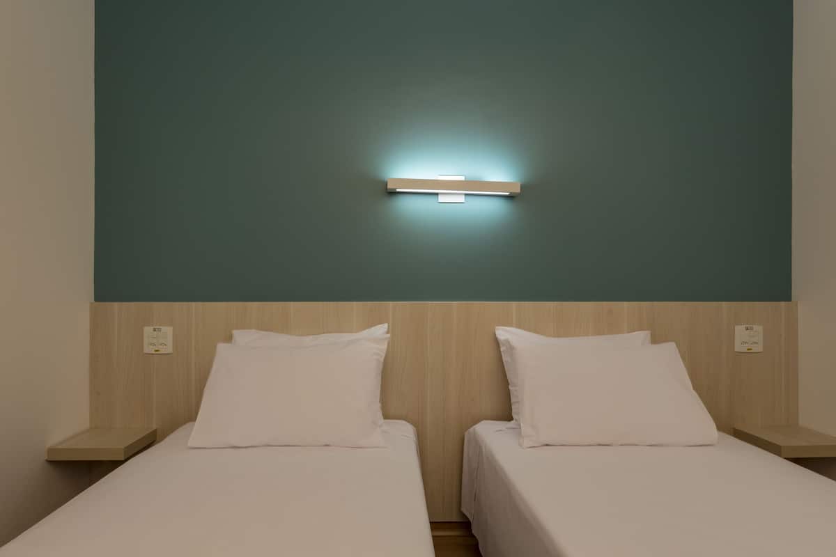 standard twin room | in-room safe, desk, blackout curtains, soundproofing