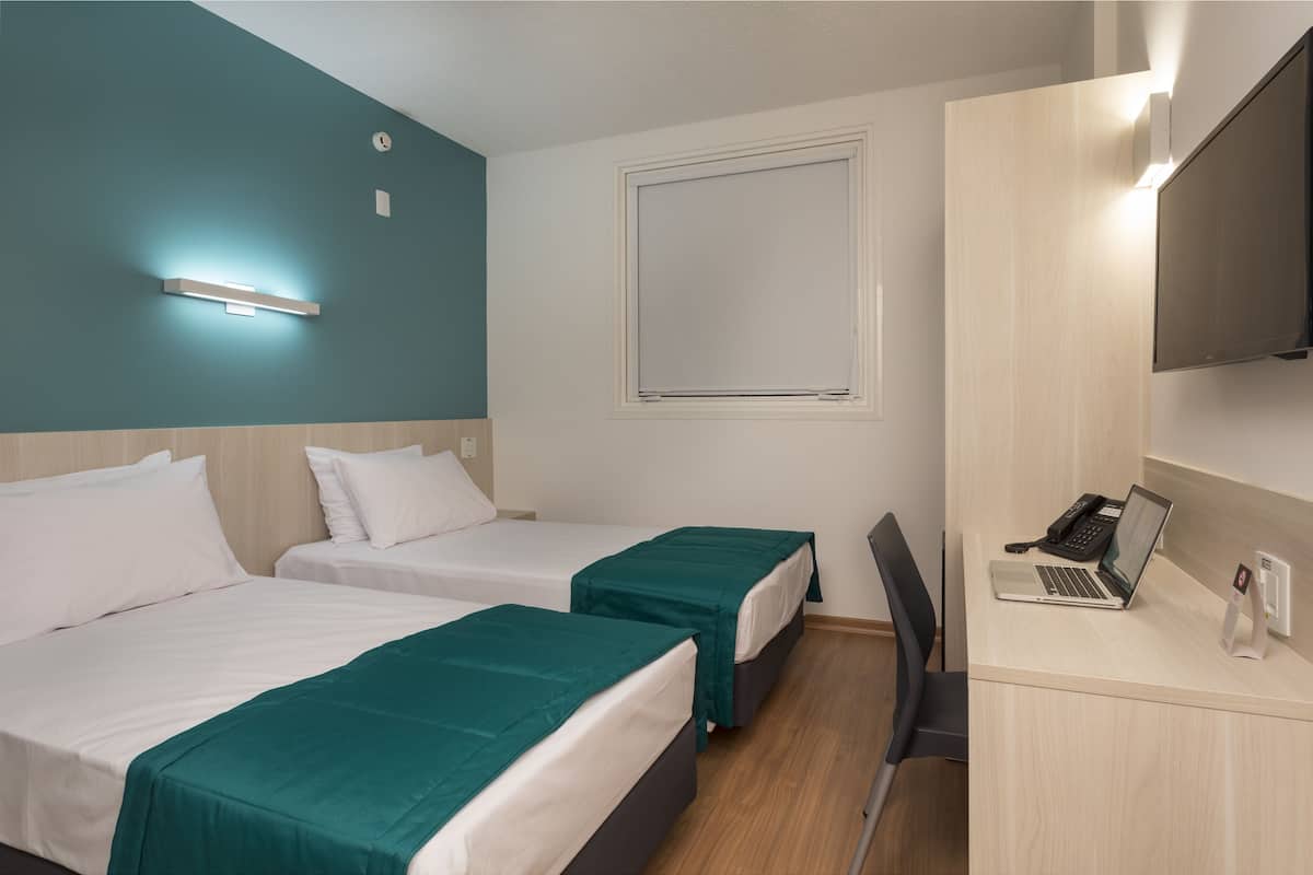 standard twin room | in-room safe, desk, blackout curtains, soundproofing