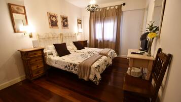 Desk, blackout curtains, free cots/infant beds, free WiFi