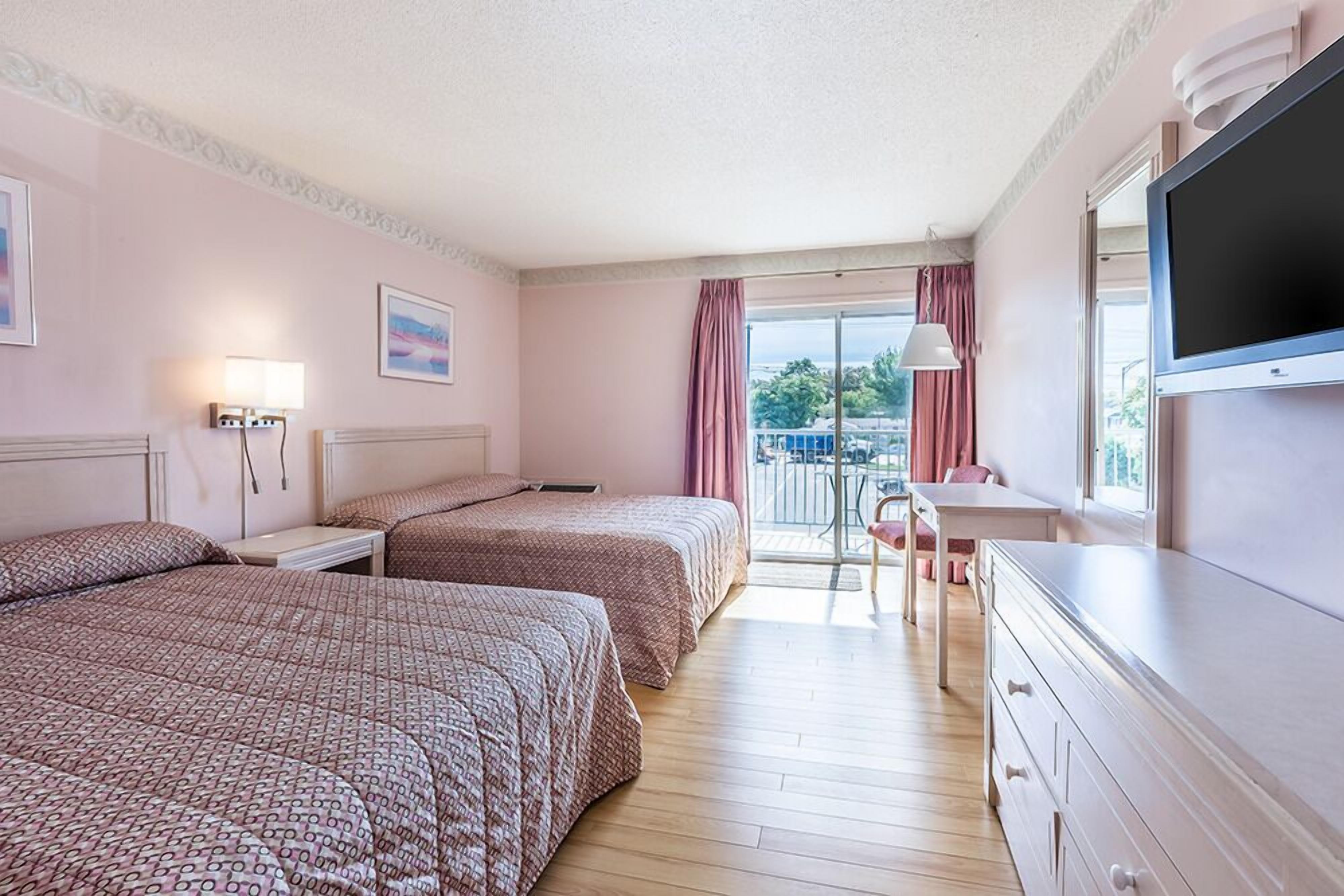 superior room, kitchenette | select comfort beds, desk, laptop workspace, blackout curtains