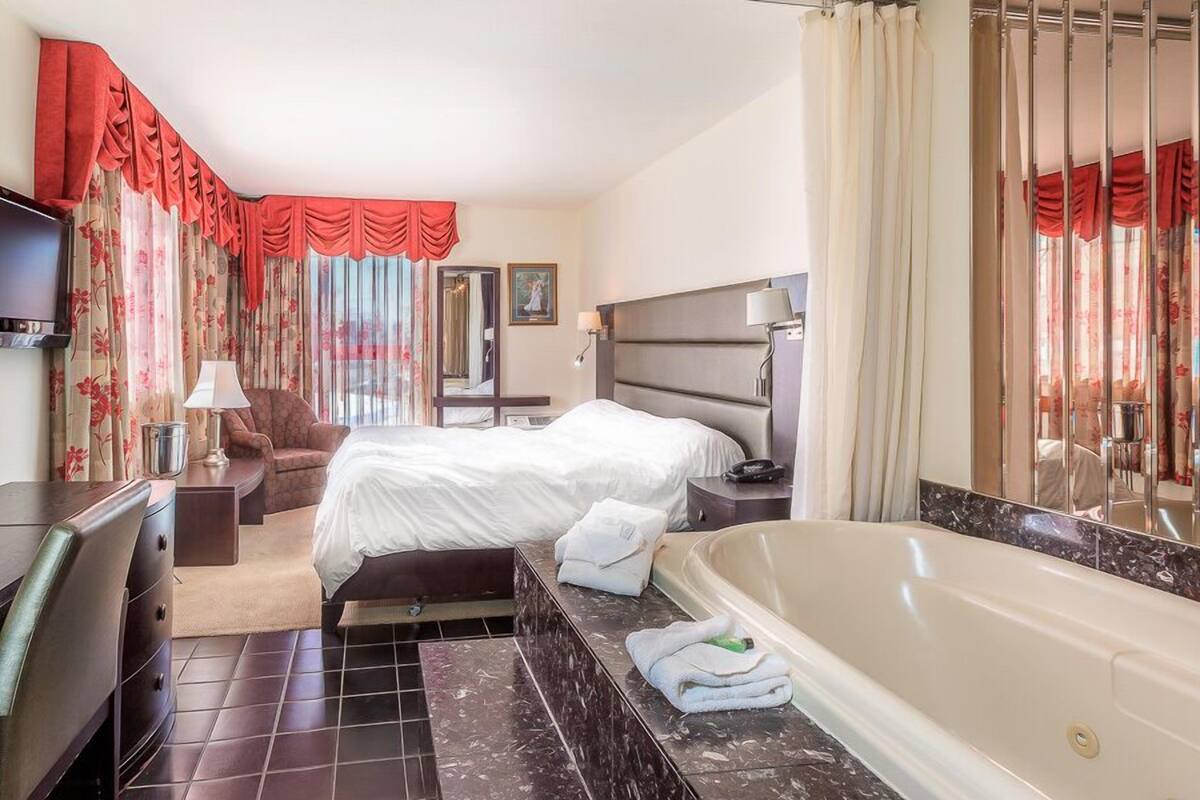 standard suite, jetted tub | select comfort beds, desk, laptop workspace, blackout curtains