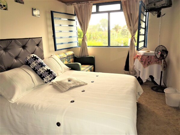 Double Room, Shared Bathroom, Garden View | In-room safe, iron/ironing board, rollaway beds