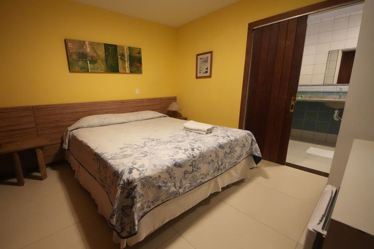 Economy kamer | Een minibar, een kluis op de kamer, gratis wifi, beddengoed
