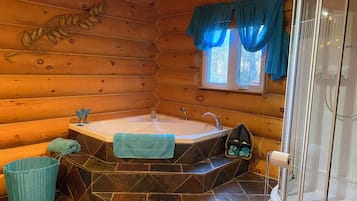 Separate tub and shower, deep soaking tub, hair dryer, towels