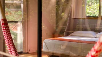 Habitación Deluxe, 1 cama King size | Caja de seguridad en la habitación, wifi gratis y ropa de cama