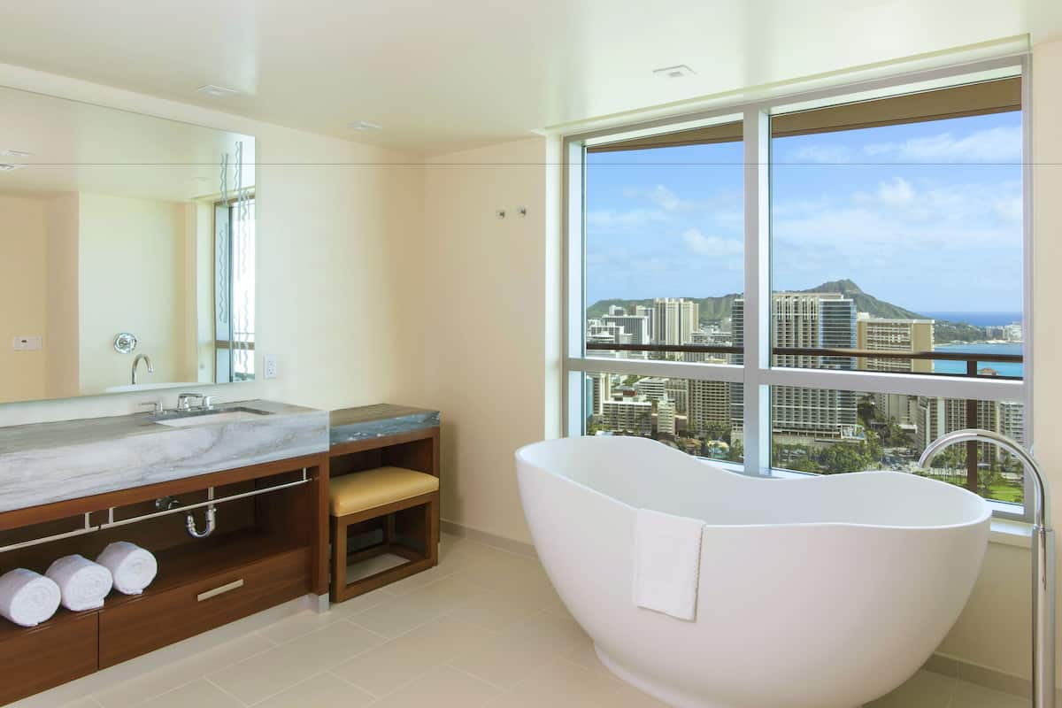 separate bathtub and shower, designer toiletries, hair dryer, bidet