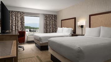 Premium bedding, desk, iron/ironing board, free cribs/infant beds