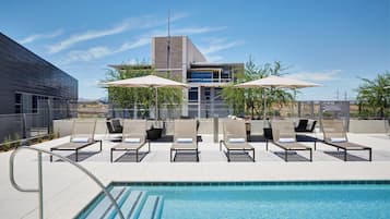 Outdoor pool, open 6:00 AM to 10:00 PM, pool umbrellas, pool loungers