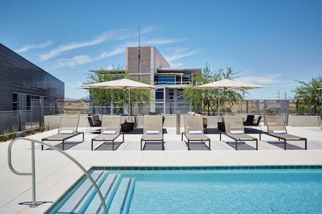 Outdoor pool, open 6:00 AM to 10:00 PM, pool umbrellas, sun loungers