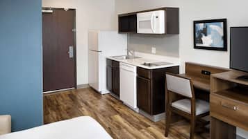 Desk, laptop workspace, blackout curtains, iron/ironing board