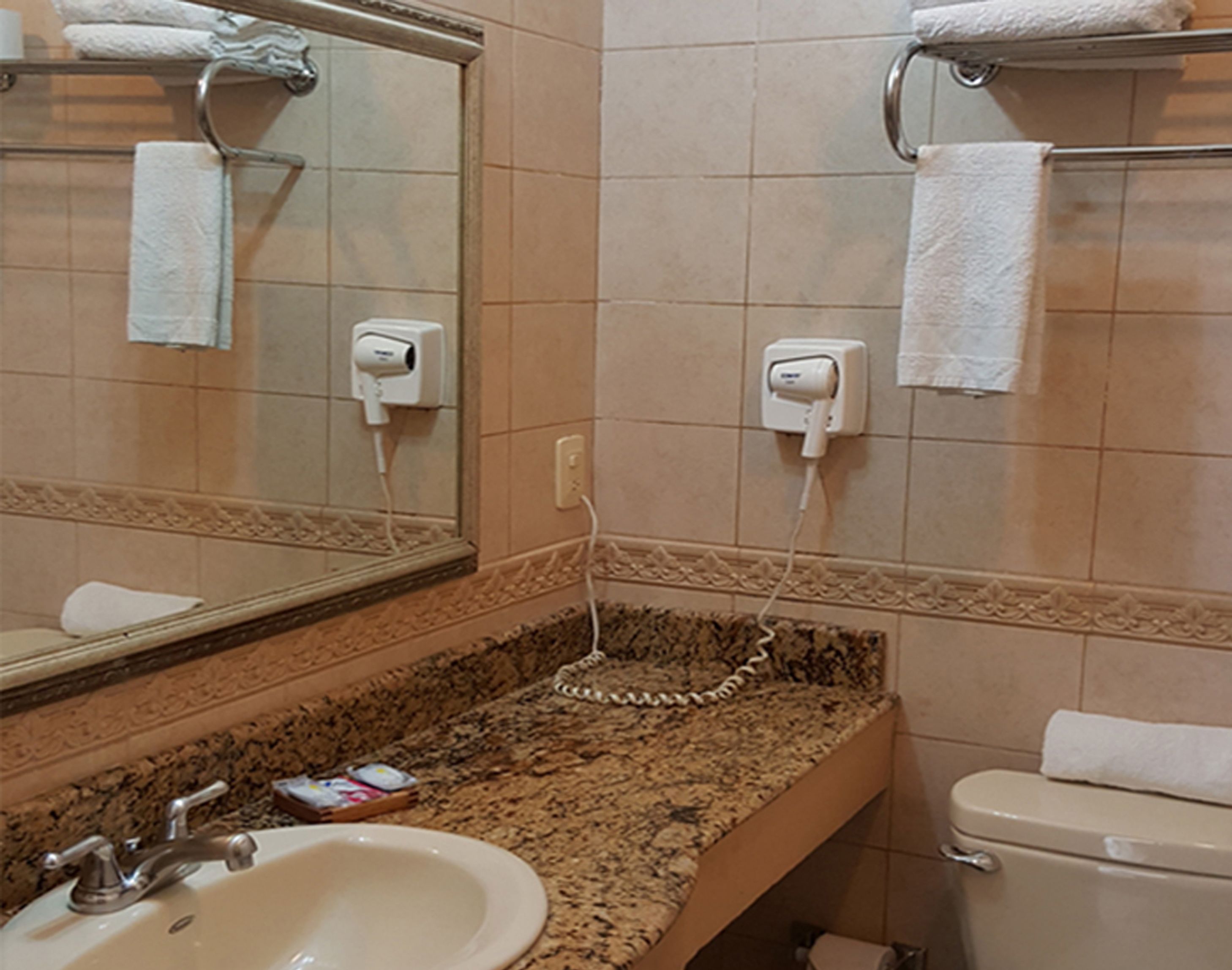 premium suite, 1 bedroom, refrigerator & microwave, corner | bathroom | combined shower/bathtub, free toiletries, hair dryer, towels