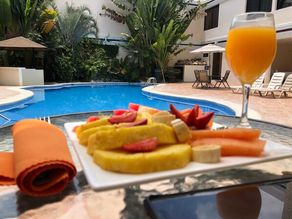 Outdoor pool, open 8:00 AM to 10:00 PM, sun loungers