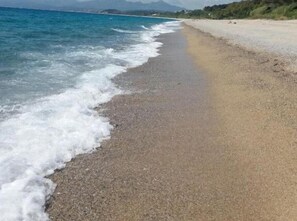 Plage, parasols, serviettes de plage