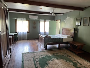Family Triple Room, 1 Bedroom, Bathtub, Garden View | 1 bedroom, individually decorated, individually furnished, rollaway beds - Oceania House (Home Island)
