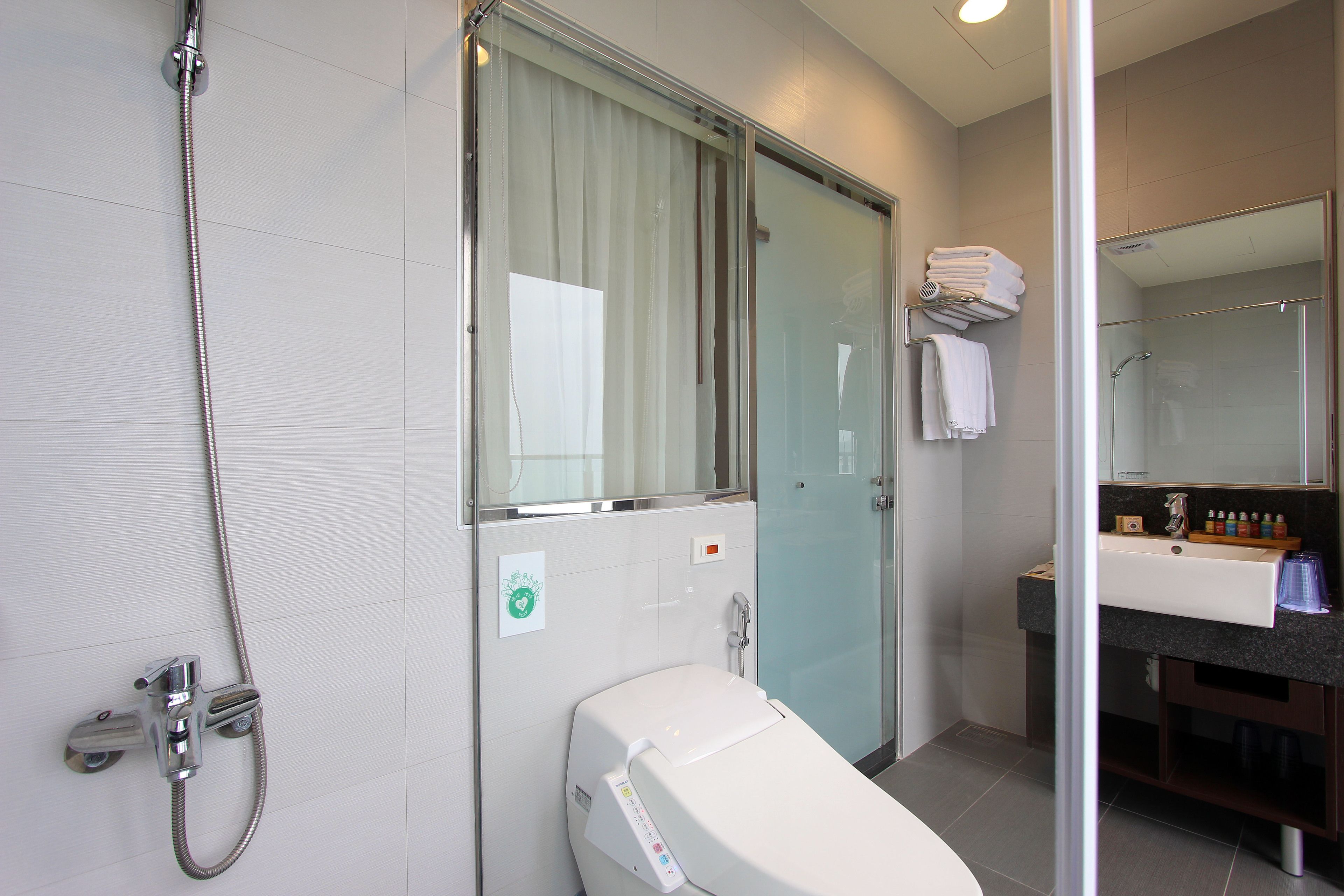 free toiletries, hair dryer, slippers, towels