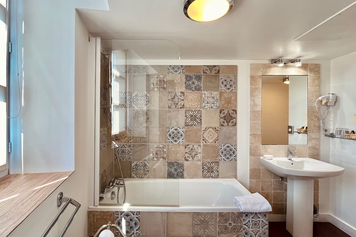 prestige twin room | bathroom | designer toiletries, hair dryer, towels, soap