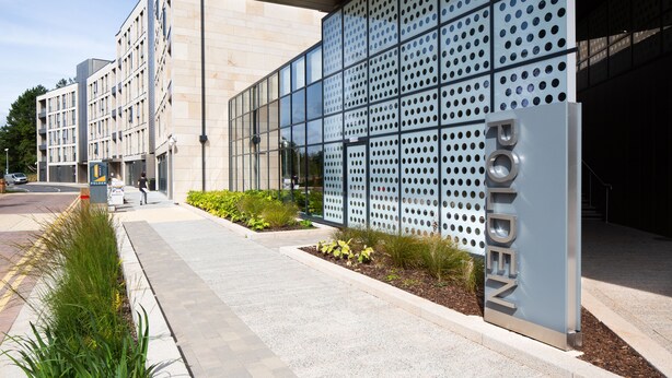 A modern building with a large sign reading "OLDEN". - University of Bath Guest Accommodation (Bath)