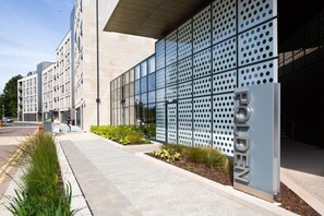 A modern building with a large sign reading "OLDEN". - University of Bath Guest Accommodation (Bath)