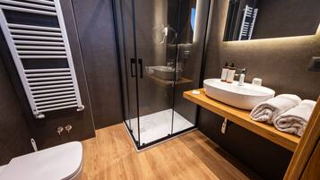 Junior Room, 2 Bedrooms, Tower | Bathroom | Shower, free toiletries, hair dryer, towels